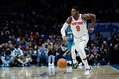 New York Knicks guard RJ Barrett (9) pushes the ball up court against the Charlotte Hornets during the second half at Spectrum Center