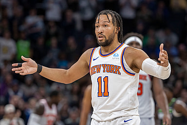 New York Knicks guard Jalen Brunson (11) looks towards the bench after a call on the floor against the Minnesota Timberwolves in the second half at Target Center