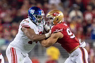 New York Giants offensive tackle Evan Neal (73) blocks San Francisco 49ers defensive end Nick Bosa (97) during the fourth quarter at Levi's Stadium