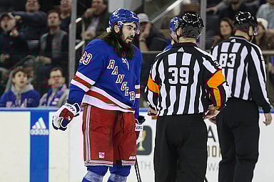 New York Rangers center Mika Zibanejad (93) argues with referee Brandon Blandina (39) in the first period against the Columbus Blue Jackets at Madison Square Garden