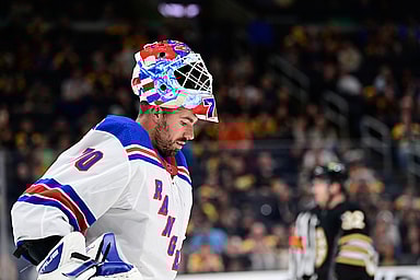 New York Rangers goalie Louis Domingue (70)  waits for play to begin against the Boston Bruins during the third period at TD Garden