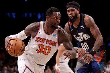 New York Knicks forward Julius Randle (30) drives to the basket against Brooklyn Nets forward Royce O'Neale (00) during the second quarter at Barclays Center