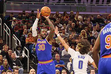 New York Knicks forward Julius Randle (30) shoots the ball over Orlando Magic guard Anthony Black (0) during the second quarter at KIA Center
