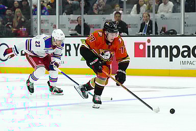 Anaheim Ducks right wing Frank Vatrano (77) skates with the puck against New York Rangers defenseman Adam Fox (23) in the second period at Honda Center
