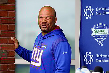 New York Giants special teams coordinator Thomas McGaughey jokes with reporters that he's no longer the young coach with players calling him, "O.G. and unc."