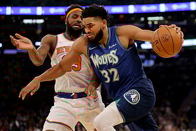 Minnesota Timberwolves center Karl-Anthony Towns (32) drives to the basket against New York Knicks center Mitchell Robinson (23) during the first quarter at Madison Square Garden