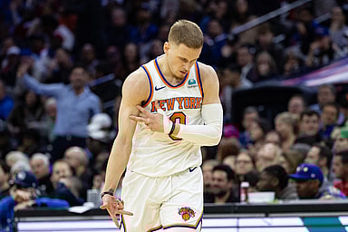 New York Knicks guard Donte DiVincenzo (0) reacts after his three pointer against the Philadelphia 76ers during the fourth quarter at Wells Fargo Center