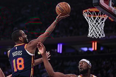 New York Knicks guard Alec Burks (18) drives for a shot against Atlanta Hawks forward Bruno Fernando (24) during the second half at Madison Square Garden