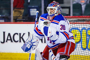 New York Rangers goaltender Henrik Lundqvist (30) guards his net during the warmup period before a game against the Calgary Flames at Scotiabank Saddledome