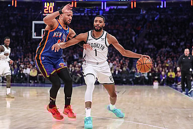 Brooklyn Nets forward Mikal Bridges (1) looks to drive past New York Knicks guard Jalen Brunson (11) in the first quarter at Madison Square Garden
