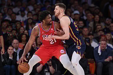 Philadelphia 76ers center Joel Embiid (21) is defended by New York Knicks center Isaiah Hartenstein (55) during the second half during game two of the first round for the 2024 NBA playoffs at Madison Square Garden