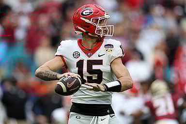 Dec 30, 2023; Miami Gardens, FL, USA; Georgia Bulldogs quarterback Carson Beck (New York Giants prospect) (15) drops back to pass against the Florida State Seminoles during the first half in the 2023 Orange Bowl at Hard Rock Stadium. Mandatory Credit: Nathan Ray Seebeck-USA TODAY Sports