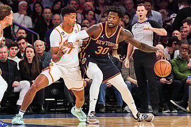 Dec 7, 2022; New York, New York, USA;   New York Knicks forward Julius Randle (30) dribbles the ball defended by Atlanta Hawks guard Jarrett Culver (7) during the first quarter at Madison Square Garden. Mandatory Credit: Dennis Schneidler-USA TODAY Sports