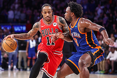 Apr 14, 2024; New York, New York, USA;  Chicago Bulls forward DeMar DeRozan (11) looks to drive past New York Knicks forward OG Anunoby (8) in the fourth quarter at Madison Square Garden. Mandatory Credit: Wendell Cruz-USA TODAY Sports