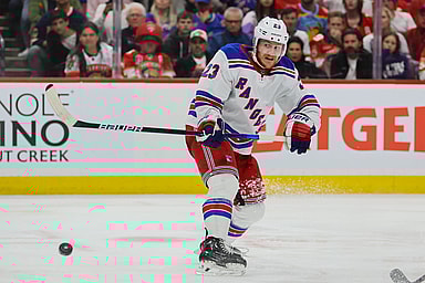 May 28, 2024; Sunrise, Florida, USA; New York Rangers defenseman Adam Fox (23) shoots the puck against the Florida Panthers during the third period in game four of the Eastern Conference Final of the 2024 Stanley Cup Playoffs at Amerant Bank Arena. Mandatory Credit: Sam Navarro-USA TODAY Sports