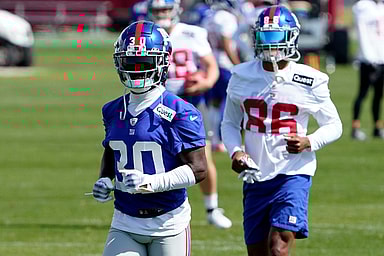 New York Giants cornerback Darnay Holmes (30) and wide receiver Darius Slayton (86) participate in organized team activities (OTA's) at the Giants training center on Wednesday, May 31, 2023, in East Rutherford.