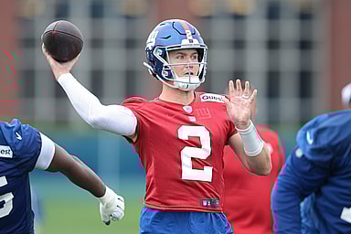 Jul 24, 2024; East Rutherford, NJ, USA; New York Giants quarterback Drew Lock (2) drops back to pass during training camp at Quest Diagnostics Training Facility. Mandatory Credit: Vincent Carchietta-USA TODAY Sports