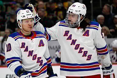 Mar 16, 2024; Pittsburgh, Pennsylvania, USA;  New York Rangers left wing Artemi Panarin (10) and center Mika Zibanejad (93) talk on the ice against the Pittsburgh Penguins during the second period at PPG Paints Arena. Mandatory Credit: Charles LeClaire-USA TODAY Sports