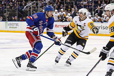 Apr 1, 2024; New York, New York, USA; New York Rangers left wing Will Cuylle (50) and Pittsburgh Penguins center Sidney Crosby (87) battle for position during the second period at Madison Square Garden. Mandatory Credit: Danny Wild-USA TODAY Sports
