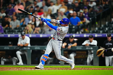 Aug 7, 2024; Denver, Colorado, USA; New York Mets outfielder Ben Gamel (21) singles in the seventh inning against the Colorado Rockies at Coors Field. Mandatory Credit: Ron Chenoy-USA TODAY Sports