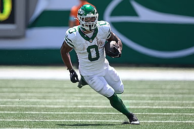Aug 10, 2024; East Rutherford, New Jersey, USA; New York Jets running back Braelon Allen (0) carries the ball during the first half against the Washington Commanders at MetLife Stadium. Mandatory Credit: Vincent Carchietta-USA TODAY Sports