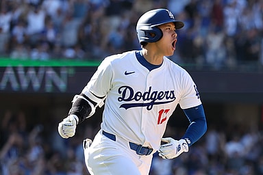 Sep 22, 2024; Los Angeles, California, USA;  Los Angeles Dodgers designated hitter Shohei Ohtani (17) celebrates on a game tying solo home run during the ninth inning against the Colorado Rockies at Dodger Stadium. Mandatory Credit: Kiyoshi Mio-Imagn Images