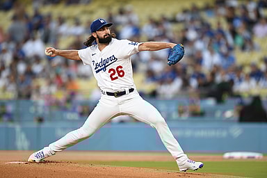 Aug 18, 2023; Los Angeles, California, USA; Los Angeles Dodgers starting pitcher Tony Gonsolin (26) throws a pitch against the Miami Marlins during the first inning at Dodger Stadium. Mandatory Credit: Jonathan Hui-Imagn Images