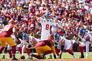 Sep 15, 2024; Landover, Maryland, USA; New York Giants quarterback Daniel Jones (8) calls a play in the first half against the New York Giants at Commanders Field. Mandatory Credit: Luke Johnson-Imagn Images
