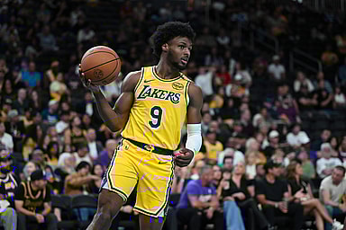 Oct 4, 2024; Palm Desert, California, USA; Los Angeles Lakers guard Bronny James (9) looks to pass against the Minnesota Timberwolves during the second half at Acrisure Arena. Mandatory Credit: Jonathan Hui-Imagn Images