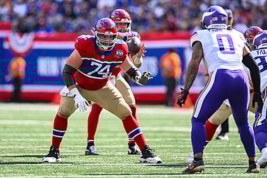 Sep 8, 2024; East Rutherford, New Jersey, USA; New York Giants guard Greg Van Roten (74) pass protects against Minnesota Vikings linebacker Ivan Pace Jr. (0) during the second half at MetLife Stadium. Mandatory Credit: John Jones-Imagn Images