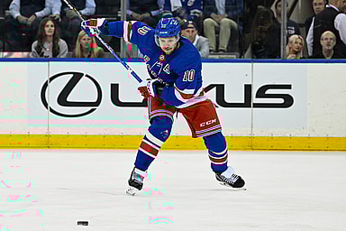 May 30, 2024; New York, New York, USA; New York Rangers left wing Artemi Panarin (10) lines up a shot against the Florida Panthers during the first period in game five of the Eastern Conference Final of the 2024 Stanley Cup Playoffs at Madison Square Garden. Mandatory Credit: Dennis Schneidler-Imagn Images