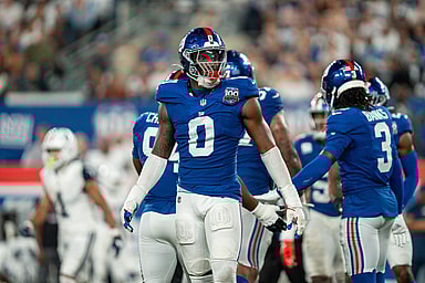 Sep 26, 2024; East Rutherford, NJ, US; New York Giants linebacker Brian Burns (0) looks at his sideline for instructions at MetLife Stadium. Mandatory Credit: Julian Guadalupe-NorthJersey.com