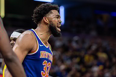 Nov 10, 2024; Indianapolis, Indiana, USA; New York Knicks center Karl-Anthony Towns (32) reacts to an and one basket in the second half against the Indiana Pacers at Gainbridge Fieldhouse. Mandatory Credit: Trevor Ruszkowski-Imagn Images