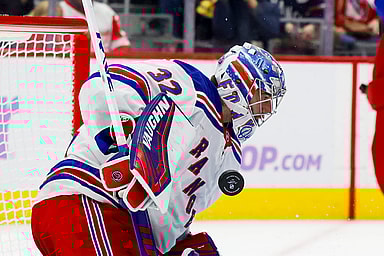 Nov 9, 2024; Detroit, Michigan, USA;  New York Rangers goaltender Jonathan Quick (32) makes a save against the Detroit Red Wings in the second period at Little Caesars Arena. Mandatory Credit: Rick Osentoski-Imagn Images