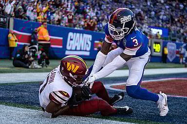 Washington Commanders wide receiver Terry McLaurin (17) catches a pass for a touchdown while being guarded by New York Giants cornerback Deonte Banks (3) during a game between the New York Giants and the Washington Commanders at MetLife Stadium in East Rutherford on Sunday, Nov. 3, 2024.