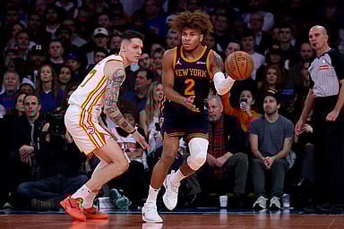 Dec 11, 2024; New York, New York, USA; New York Knicks guard Miles McBride (2) looks to pass the ball against Atlanta Hawks guard Vit Krejci (27) during the second quarter at Madison Square Garden. Mandatory Credit: Brad Penner-Imagn Images
