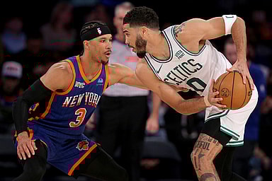 Feb 24, 2024; New York, New York, USA; Boston Celtics forward Jayson Tatum (0) controls the ball against New York Knicks guard Josh Hart (3) during the third quarter at Madison Square Garden. Mandatory Credit: Brad Penner-Imagn Images