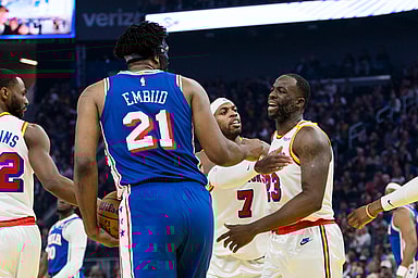 Jan 2, 2025; San Francisco, California, USA; Golden State Warriors forward Draymond Green (23) reacts after being fouled by Philadelphia 76ers center Joel Embiid (21) during the first quarter at Chase Center. Mandatory Credit: John Hefti-Imagn Images