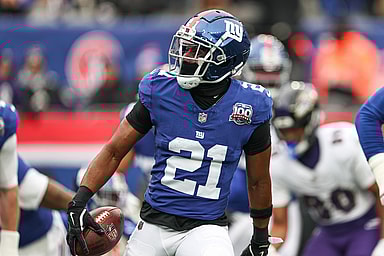 Dec 15, 2024; East Rutherford, New Jersey, USA; New York Giants cornerback Adoree' Jackson (21) celebrates  after receiving a fumble against the Baltimore Ravens during the first quarter at MetLife Stadium. Mandatory Credit: Vincent Carchietta-Imagn Images