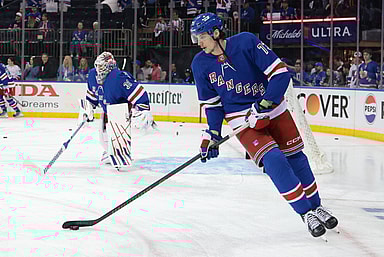 May 24, 2024; New York, New York, USA; New York Rangers center Matt Rempe (73) warms up before a game against the in front of goaltender Igor Shesterkin (31) before game two of the Eastern Conference Final of the 2024 Stanley Cup Playoffs against the Florida Panthers at Madison Square Garden. Mandatory Credit: Vincent Carchietta-USA TODAY Sports