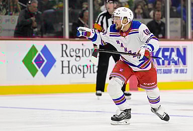 New York Rangers forward Artemi Panarin (10) celebrates the goal he assisted on by forward Chris Kreider (20) against the Minnesota Wild during the third period at Xcel Energy Center