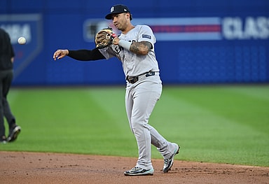 Aug 18, 2024; Williamsport, Pennsylvania, USA; New York Yankees infielder Gleyber Torres (25) throws to first against the Detroit Tigers in the second inning at BB&T Ballpark at Historic Bowman Field. Mandatory Credit: Kyle Ross-Imagn Images