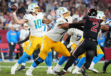 Los Angeles Chargers quarterback Justin Herbert (10) throws the ball against the Arizona Cardinals at State Farm Stadium in Glendale on Oct. 21, 2024.