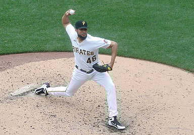 Aug 23, 2023; Pittsburgh, Pennsylvania, USA;  Pittsburgh Pirates relief pitcher Yohan Ramirez (New York Mets) (46) pitches against the St. Louis Cardinals during the fourth inning at PNC Park. Mandatory Credit: Charles LeClaire-USA TODAY Sports
