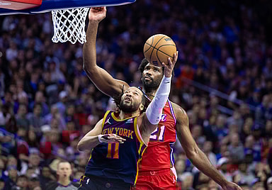 Apr 28, 2024; Philadelphia, Pennsylvania, USA; New York Knicks guard Jalen Brunson (11) drives against Philadelphia 76ers center Joel Embiid (21) during the second half of game four of the first round in the 2024 NBA playoffs at Wells Fargo Center. Mandatory Credit: Bill Streicher-USA TODAY Sports