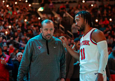 New York Knicks head coach Tom Thibodeau with guard Jalen Brunson (11) against the Phoenix Suns at Footprint Center