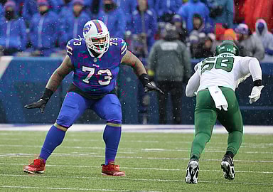 Bills Dion Dawkins drops back to pass block against Jets Carl Lawson.
