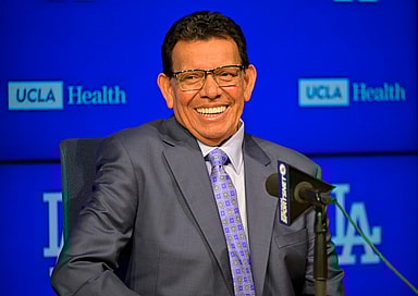 Aug 11, 2023; Los Angeles, California, USA;  Los Angeles Dodgers pitcher Fernando Valenzuela (34) speaks during a news conference prior to his jersey retirement ceremony at Dodger Stadium. Mandatory Credit: Jayne Kamin-Oncea-Imagn Images