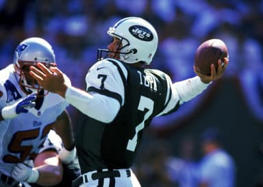 tom tupa throwing a pass in a recent game against the patriots