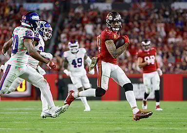 Tampa Bay Buccaneers wide receiver Mike Evans (13) runs with the ball against the New York Giants during the second half at Raymond James Stadium
